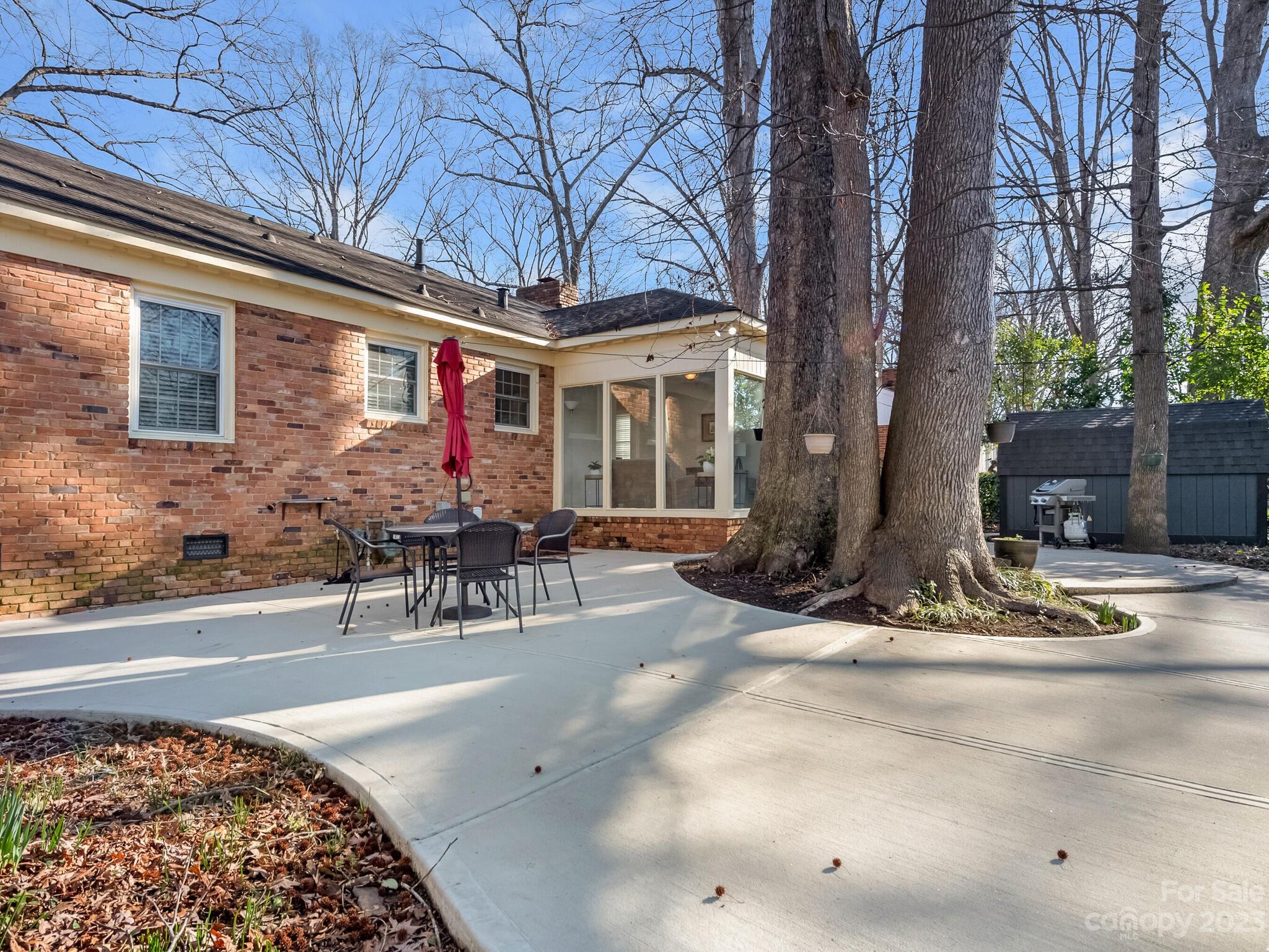 5009 Milford Road Charlotte, NC 28210 - Photo 16 of 19 a view of a backyard with a patio