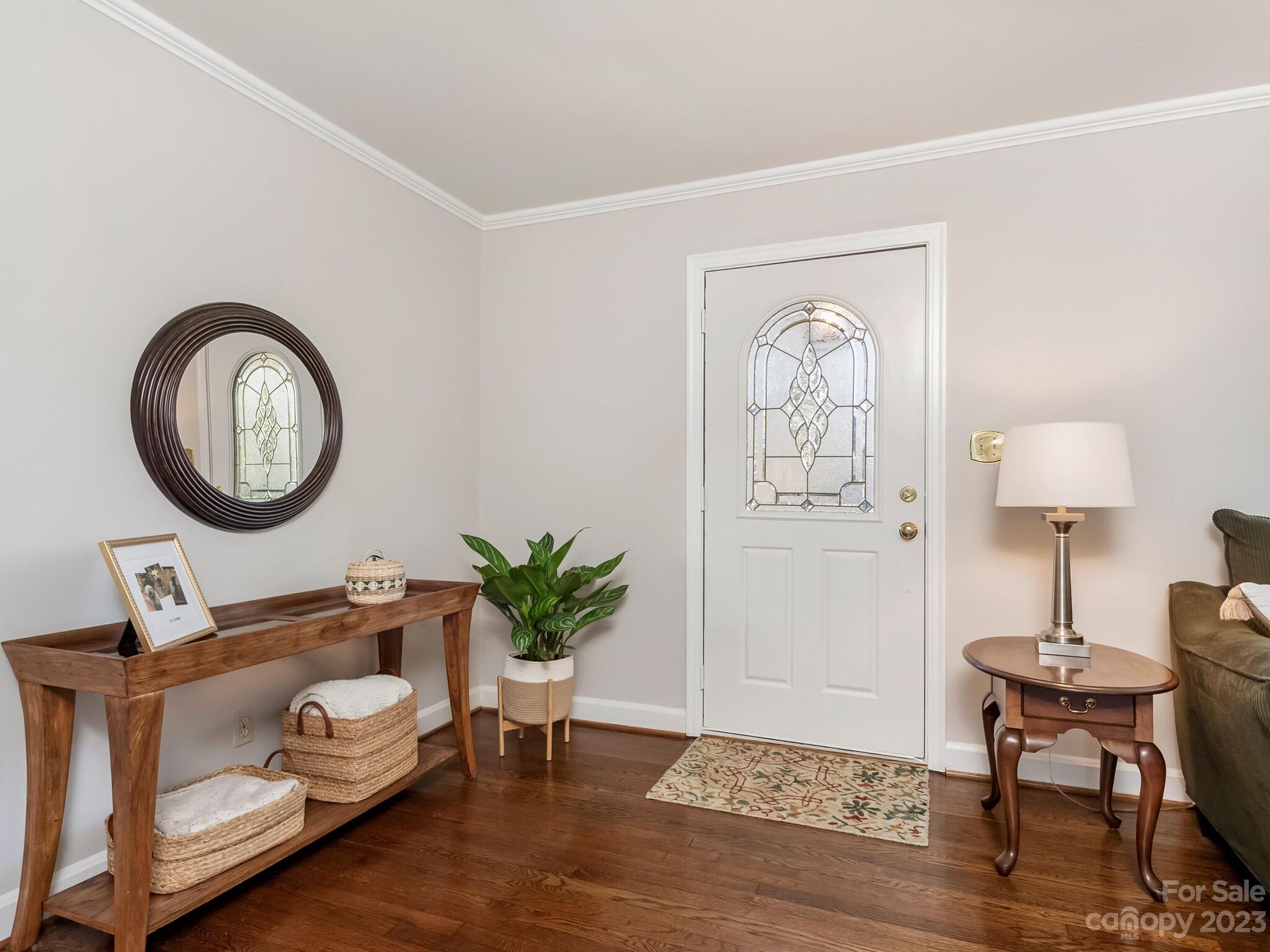 5009 Milford Road Charlotte, NC 28210 - Photo 3 of 19 a living room with furniture and a mirror