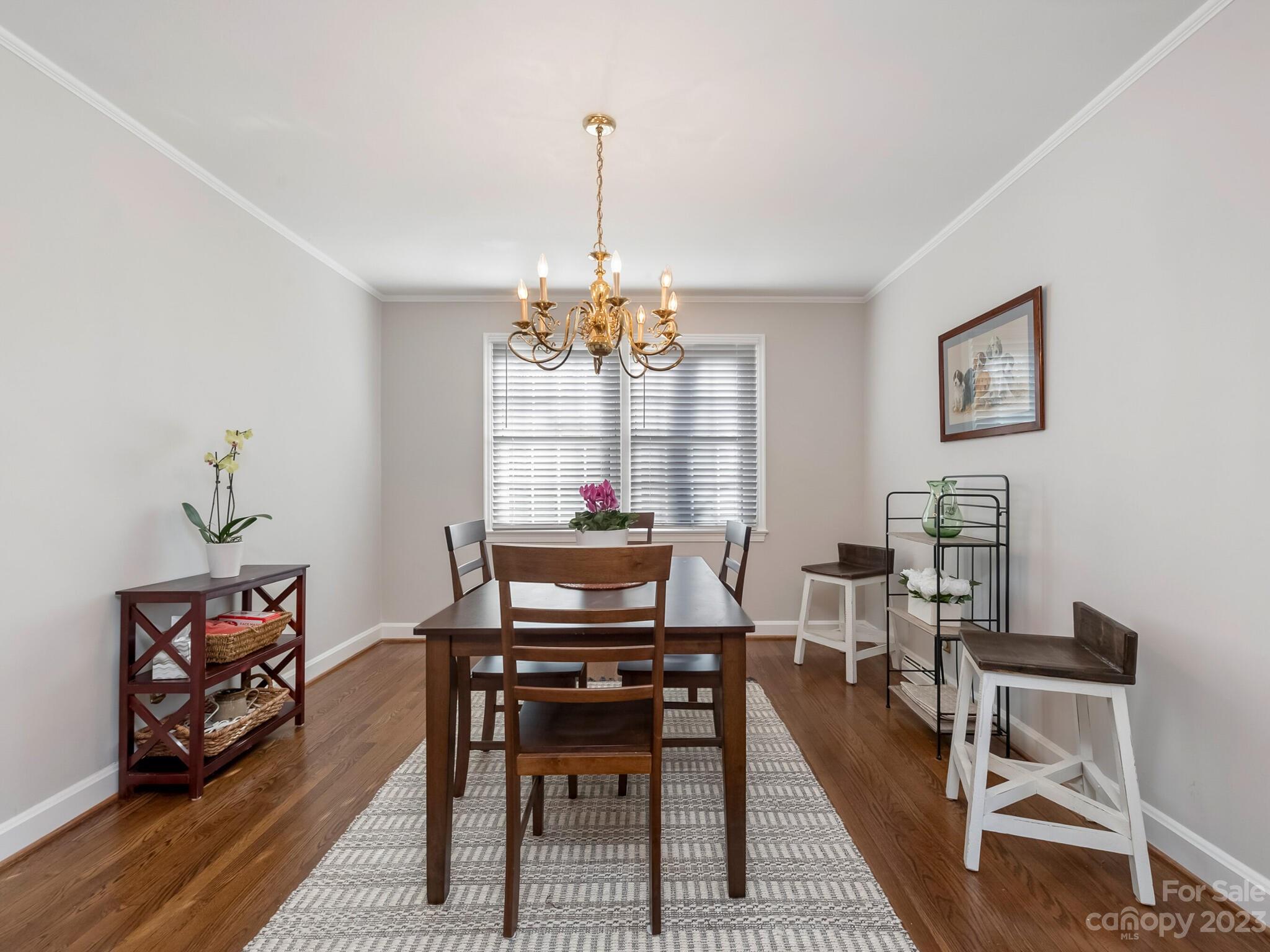 5009 Milford Road Charlotte, NC 28210 - Photo 5 of 19 a view of a dining room with furniture window and wooden floor