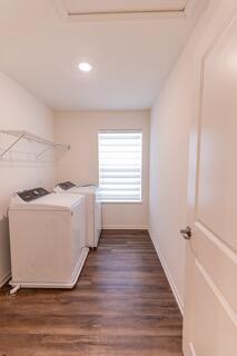 1792 East 110th Lane Crown Point, IN 46307 - Photo 15 of 17 a room with a washer and dryer