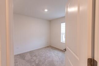 1792 East 110th Lane Crown Point, IN 46307 - Photo 8 of 17 an empty room with windows and closet