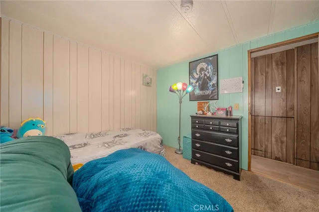 a bathroom with a bathtub sink and mirror