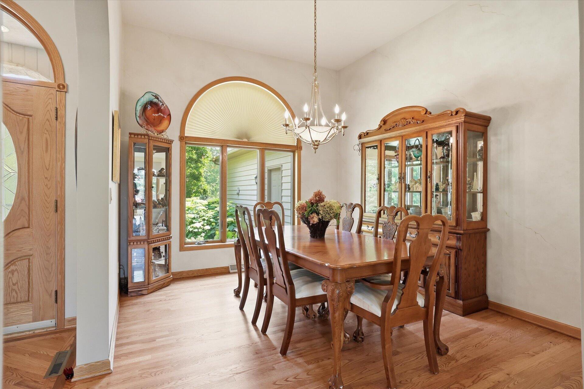 W330-s1417 County Rd C Delafield, WI 53018 - Photo 8 of 39 Formal dining room with hardwood floors