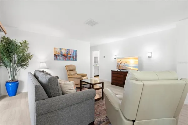a living room with furniture and a couch