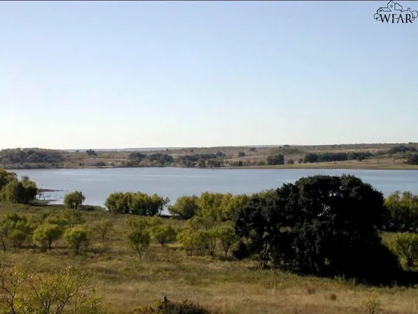 a view of lake with mountain