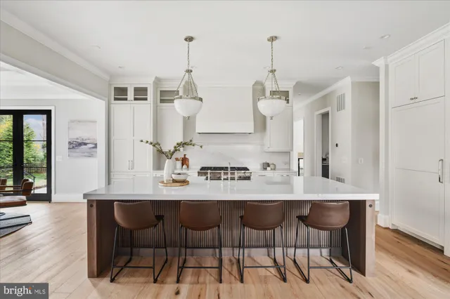 a view of a kitchen from the hallway