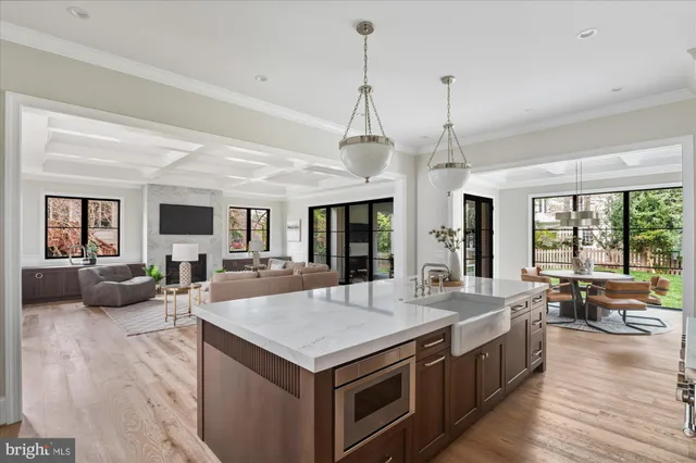 a bathroom with a black and white checkered floor