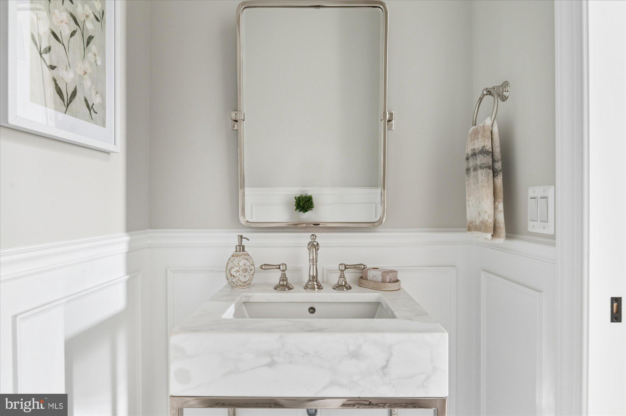 5908 Calla Drive McLean, VA 22101 - Photo 23 of 66 a bathroom with a sink and a mirror