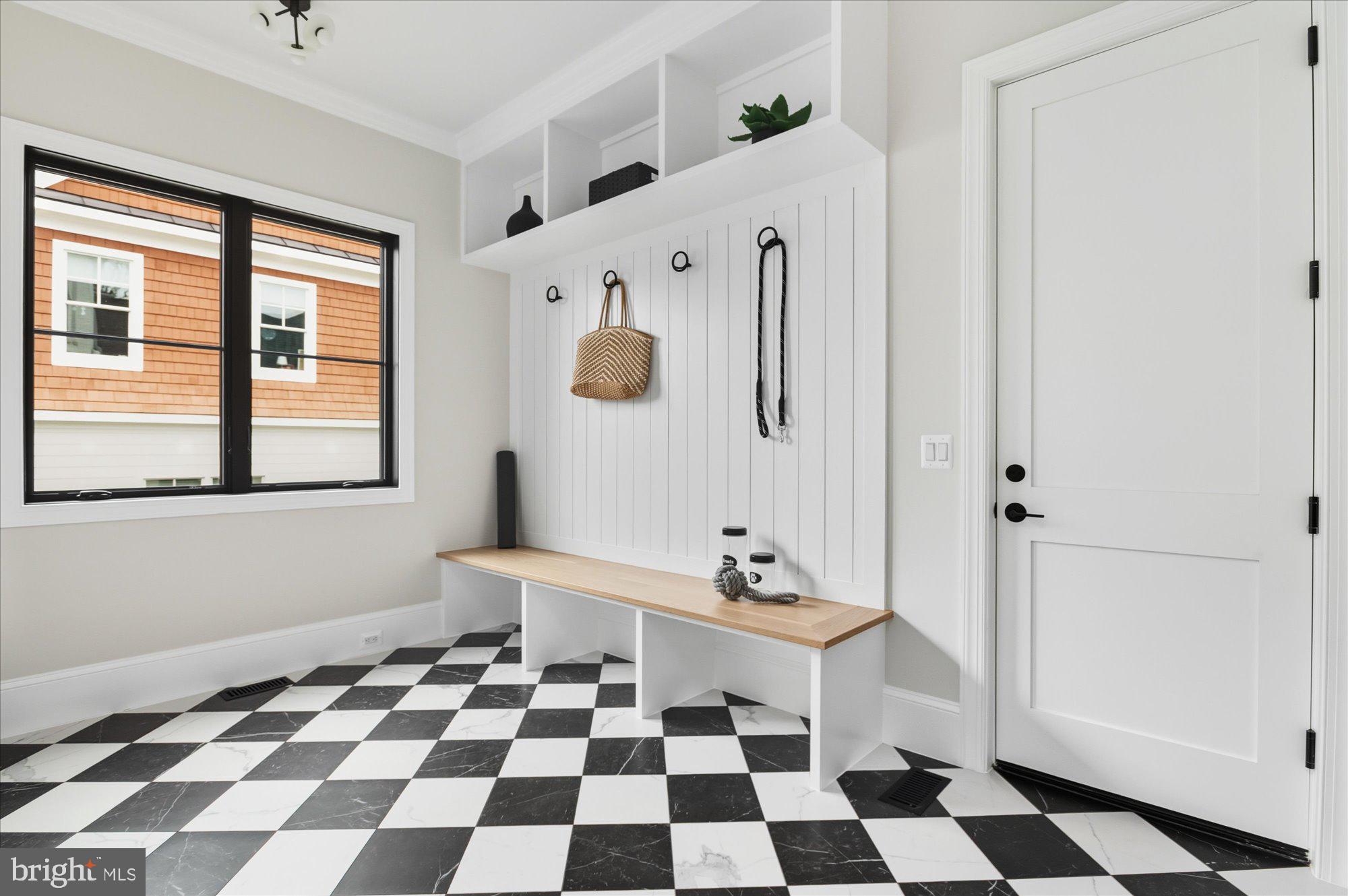 5908 Calla Drive McLean, VA 22101 - Photo 27 of 66 a bathroom with a black and white checkered floor