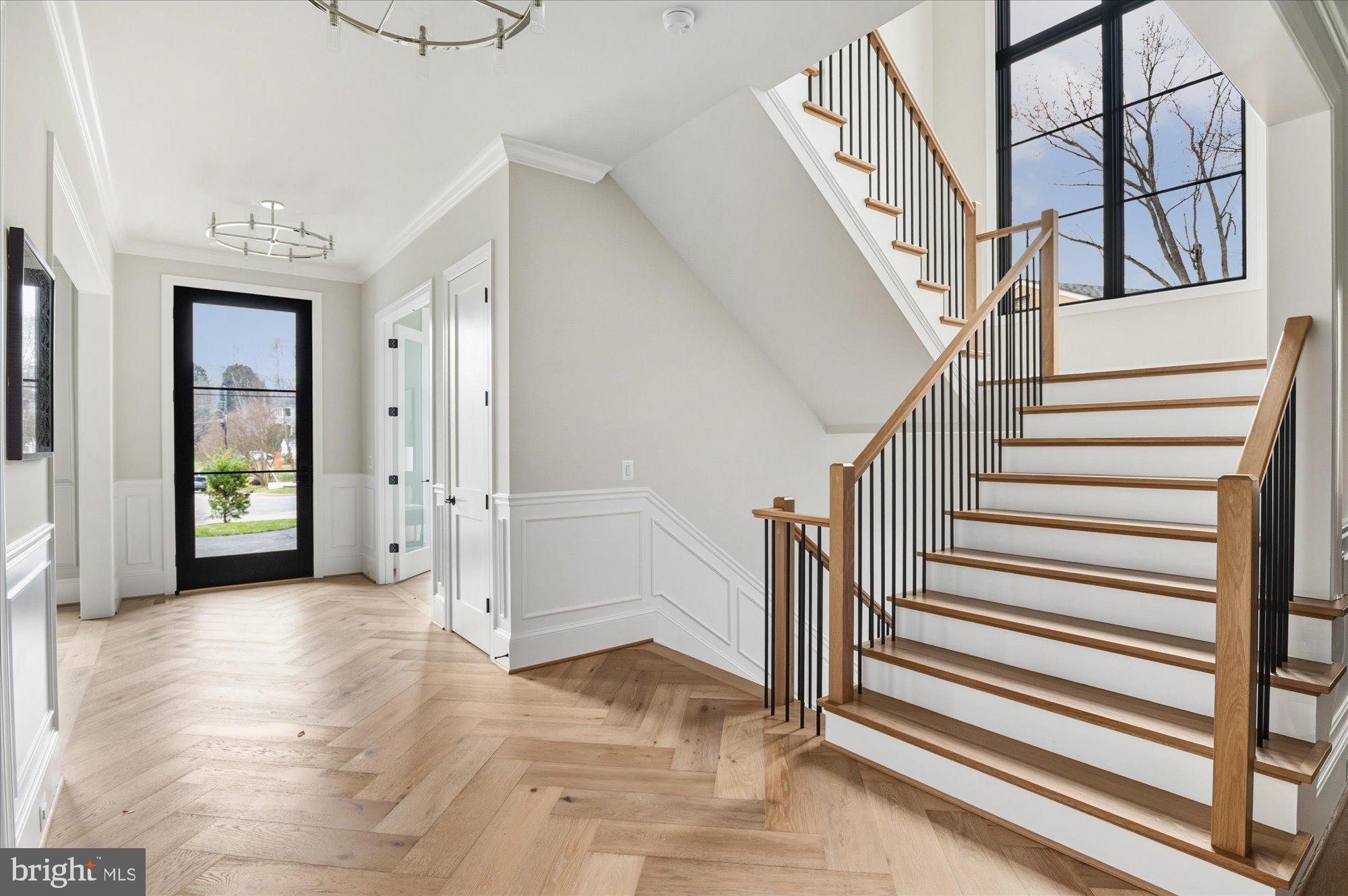 5908 Calla Drive McLean, VA 22101 - Photo 3 of 66 a view of entryway and hall with wooden floor