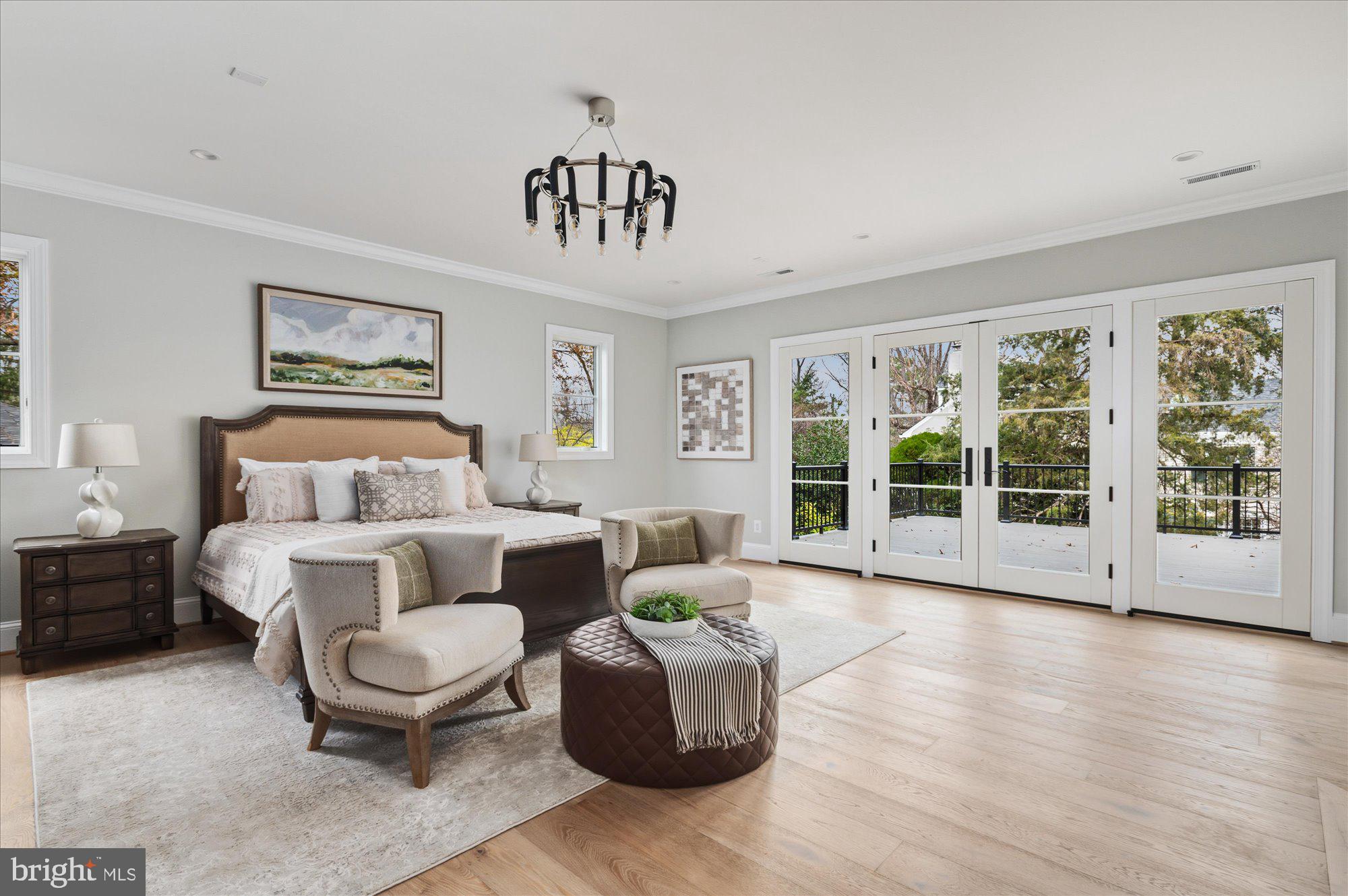 5908 Calla Drive McLean, VA 22101 - Photo 33 of 66 a living room with furniture large window and wooden floor