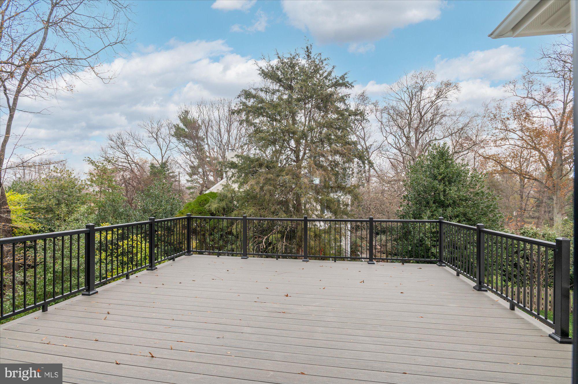 5908 Calla Drive McLean, VA 22101 - Photo 37 of 66 a view of balcony with wooden floor and fence