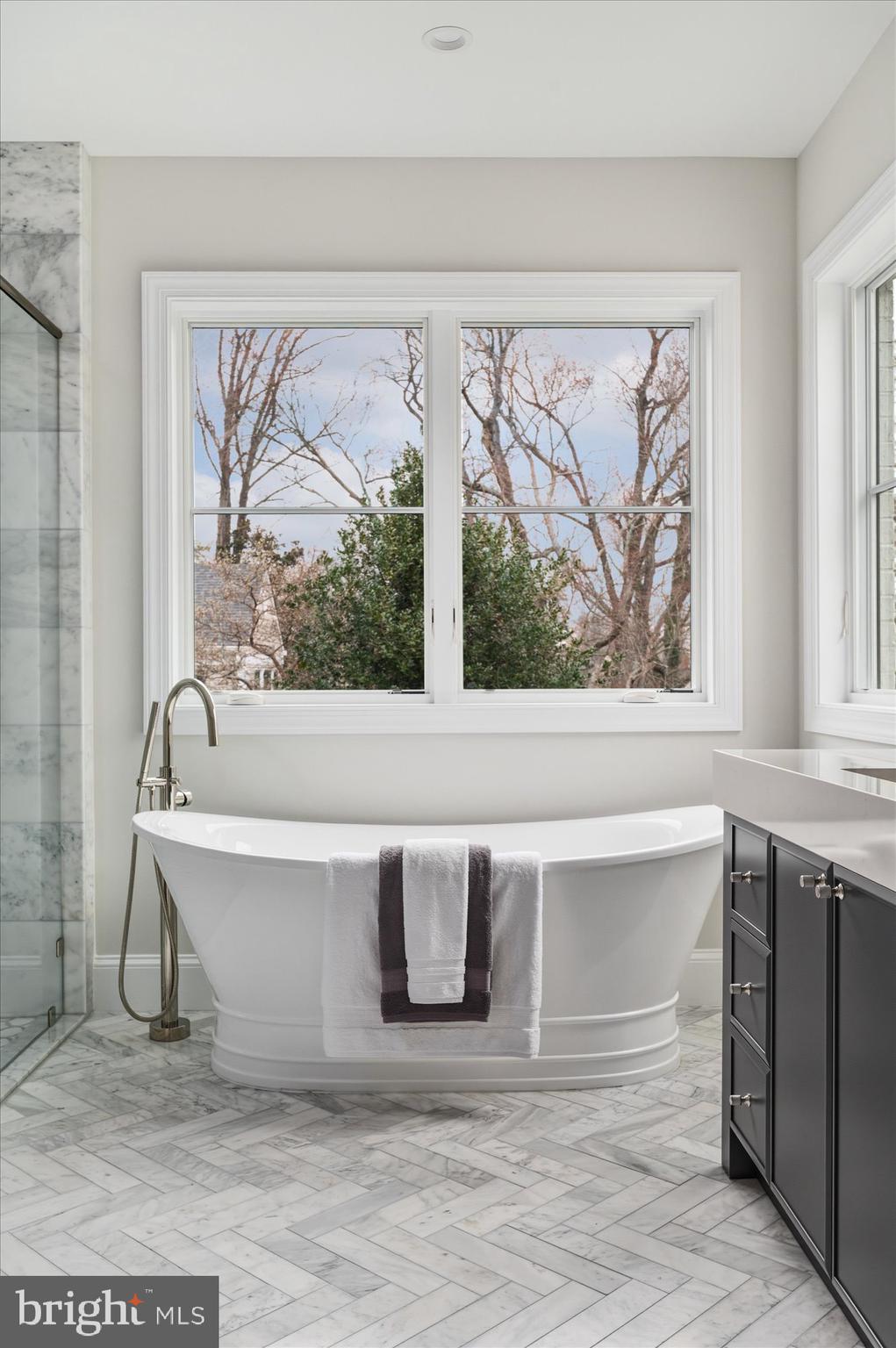 5908 Calla Drive McLean, VA 22101 - Photo 41 of 66 a white bath tub sitting next to a window