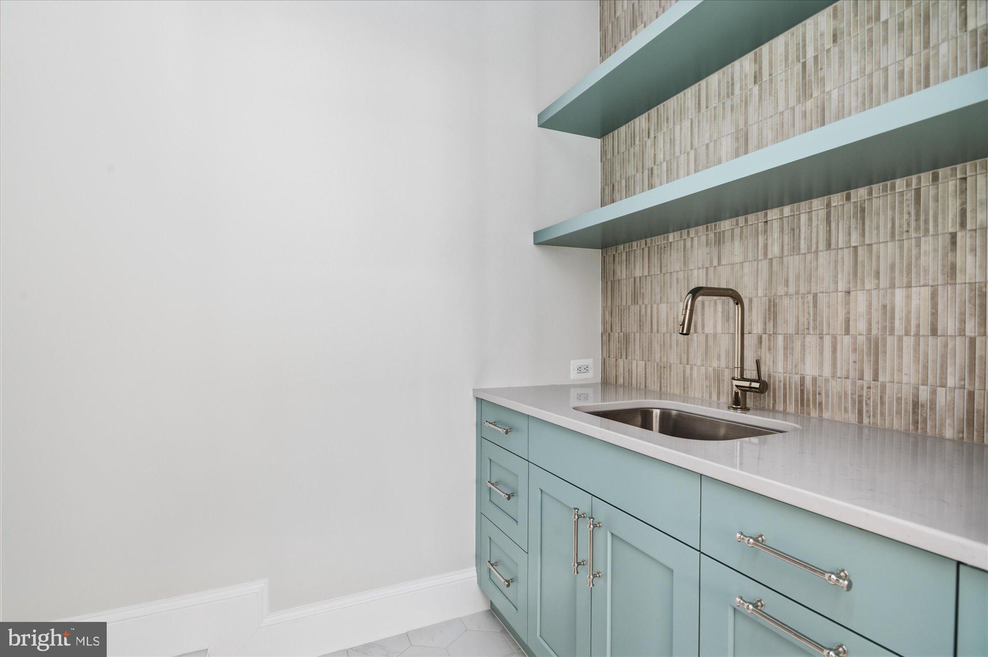 5908 Calla Drive McLean, VA 22101 - Photo 48 of 66 a close view of sink and tap