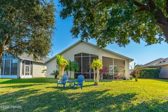 a view of a livingroom with furniture and gym equipment
