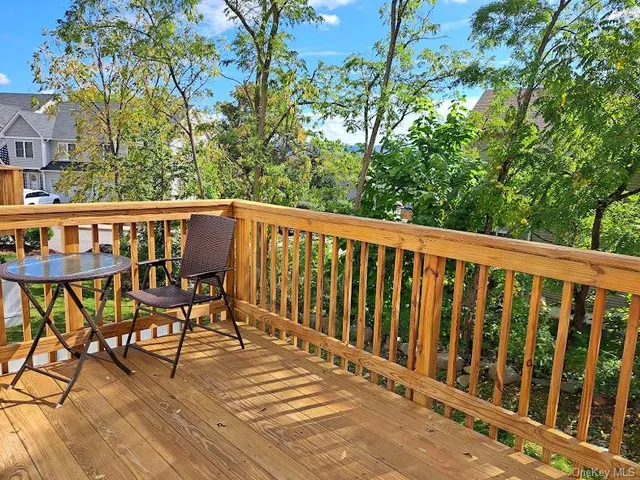 a view of a chairs and table on the wooden floor