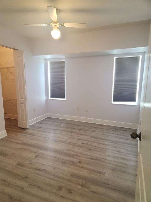 26270 Explorer Road Punta Gorda, FL 33983 - Photo 17 of 22 wooden floor in an empty room with a window