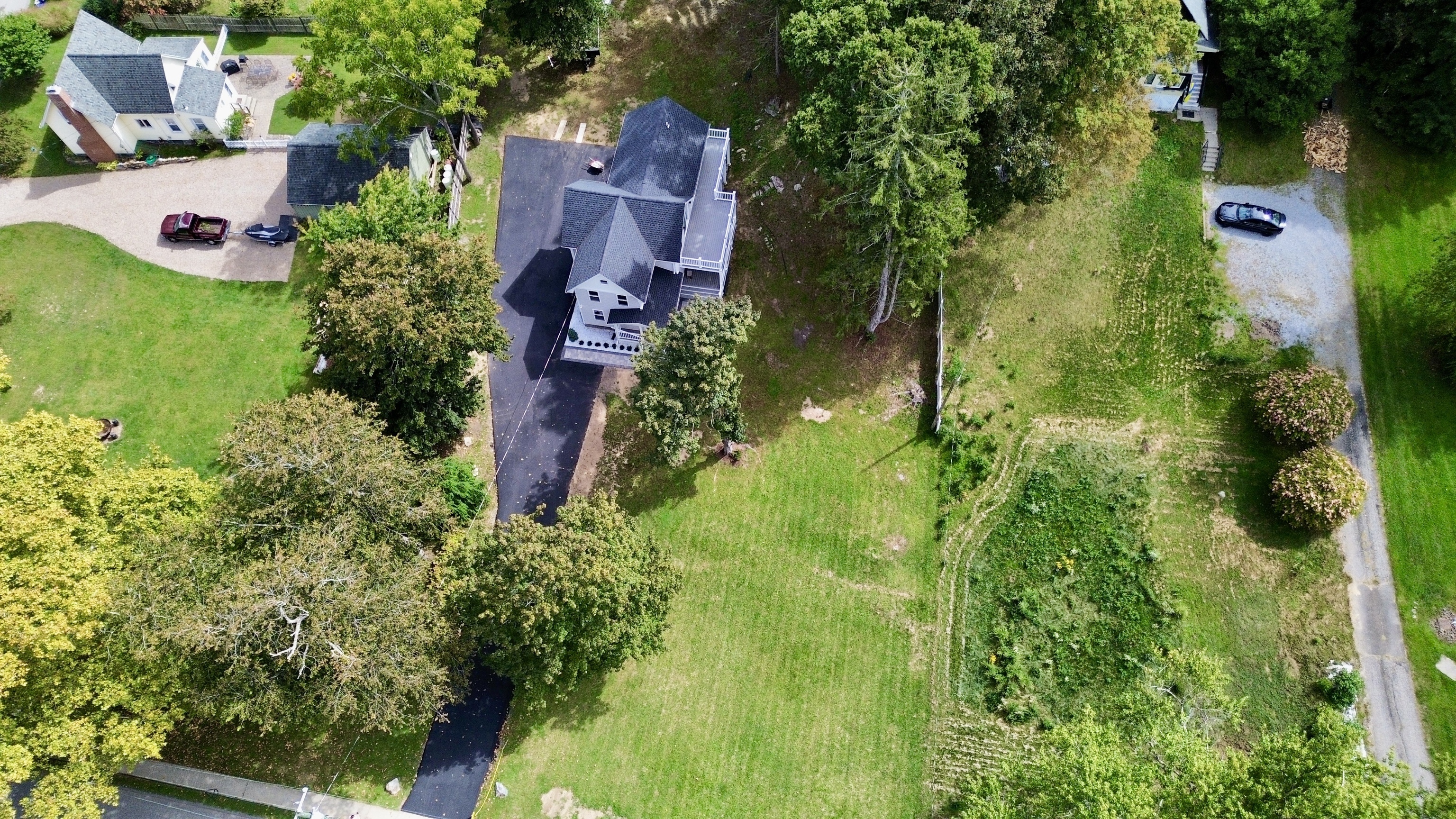 62 River Street Deep River, CT 06417 - Photo 4 of 4 an aerial view of residential house with outdoor space and trees all around