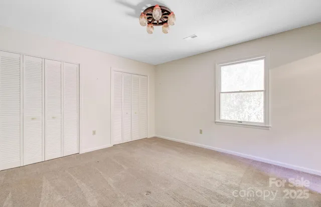 a view of a room with a window