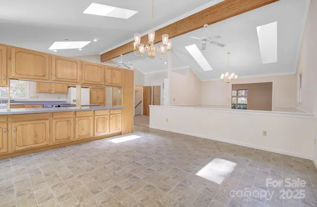 a view of a kitchen with furniture and cabinets