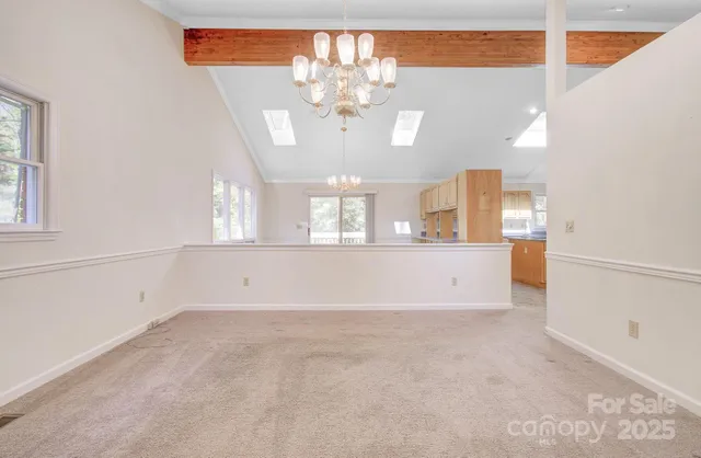 a view of a living room with chandelier