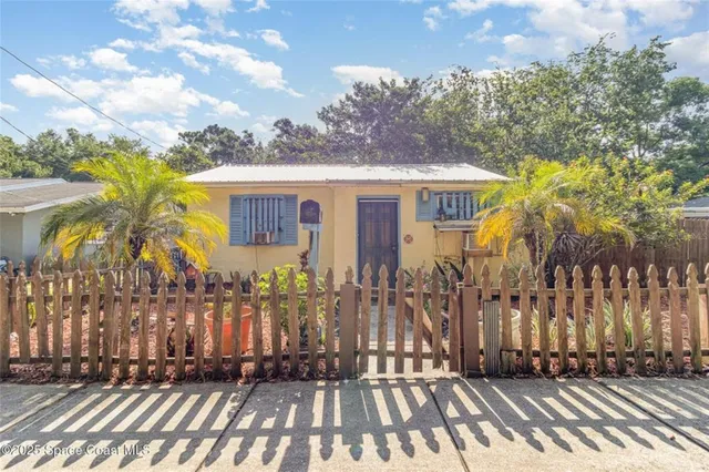 front view of house with a garden
