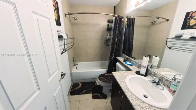 a bathroom with a sink a toilet and a bathtub