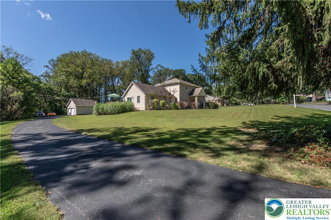 3256 Woodlea Road Orefield, PA 18069 - Photo 2 of 43 a view of a house with a yard