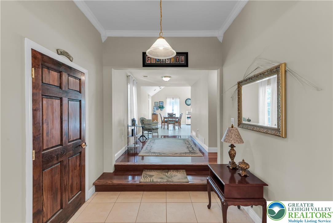 3256 Woodlea Road Orefield, PA 18069 - Photo 23 of 43 a view of hall way with furniture and entryway