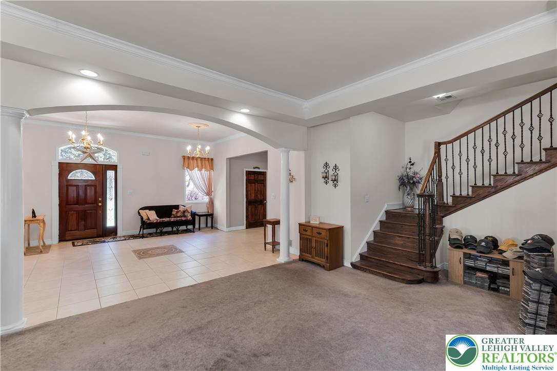 3256 Woodlea Road Orefield, PA 18069 - Photo 31 of 43 a view of a livingroom with furniture and stairs