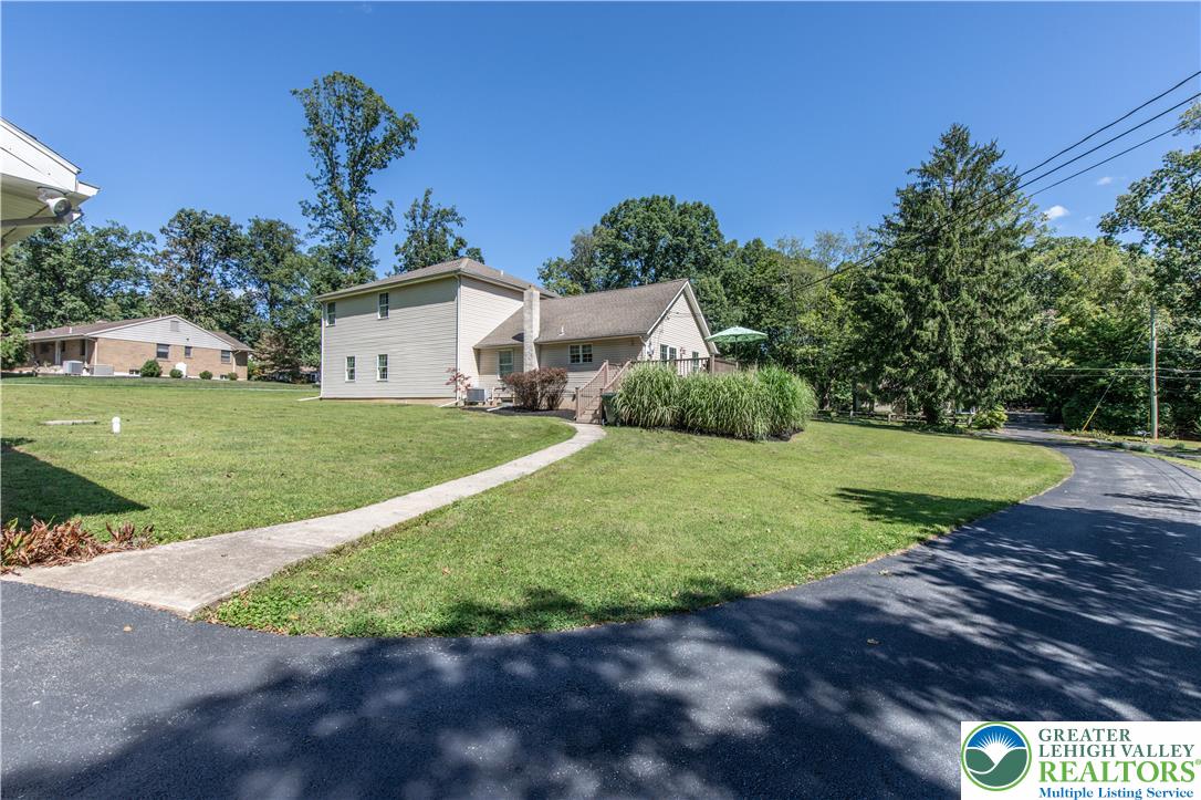 3256 Woodlea Road Orefield, PA 18069 - Photo 8 of 43 a view of a house with a yard