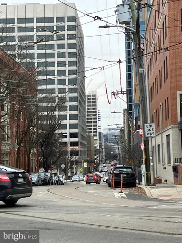 a view of a street with cars