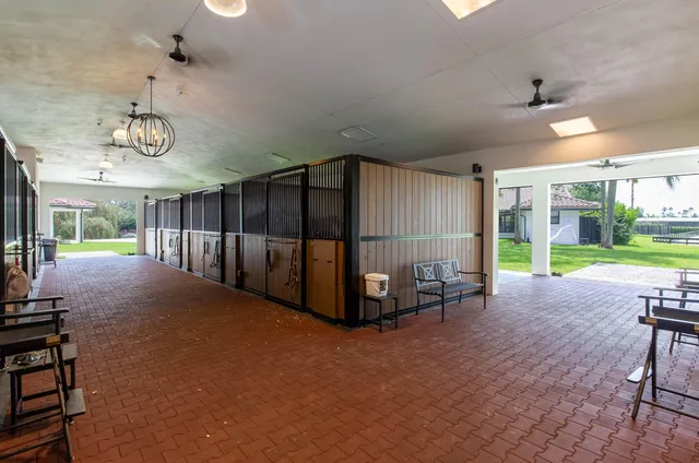 a view of a livingroom with furniture and a yard