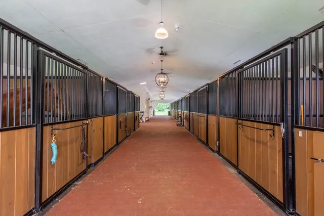 a view of a hallway with stairs