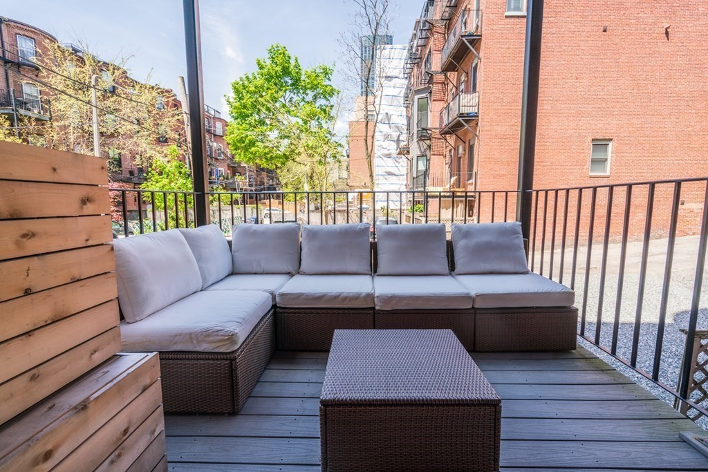 501 Columbus Avenue, Unit 2 Boston, MA 02118 - Photo 15 of 16 a roof deck with couch