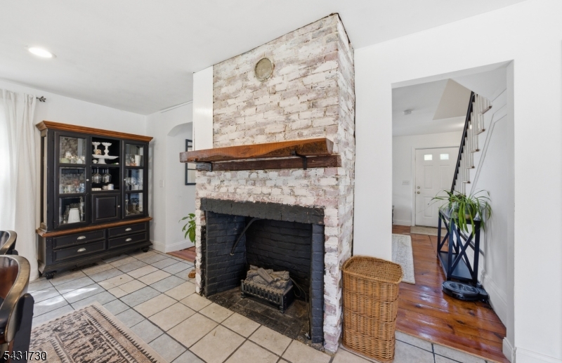 105 Main Street Lebanon, NJ 08833 - Photo 7 of 25 a living room with furniture and a fireplace