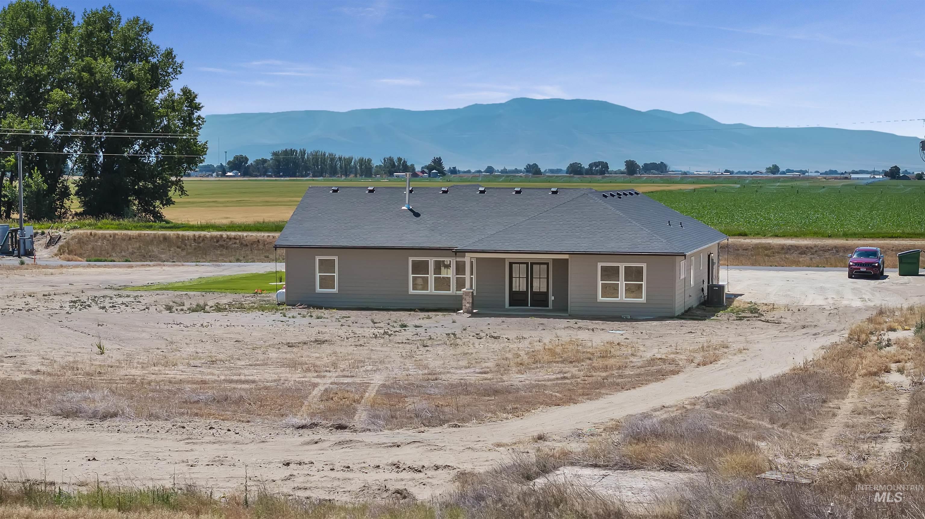 378 West 100 South Rupert, ID 83350 - Photo 40 of 50 Single-story residence featuring gray siding and a dark shingle roof