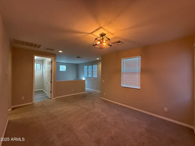 a view of a livingroom with a furniture