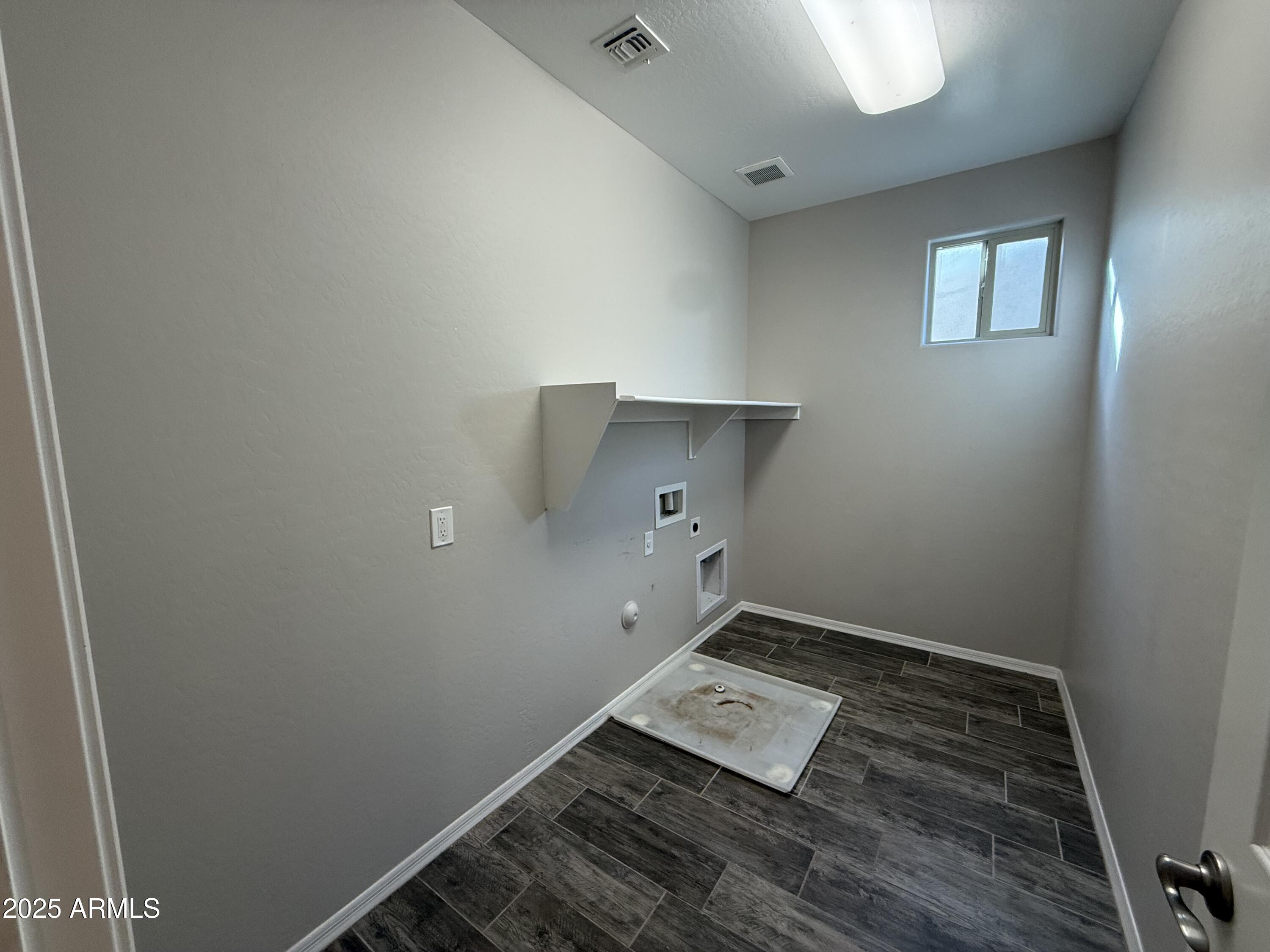 3786 East Robert Street Gilbert, AZ 85295 - Photo 13 of 22 a room with storage and utility