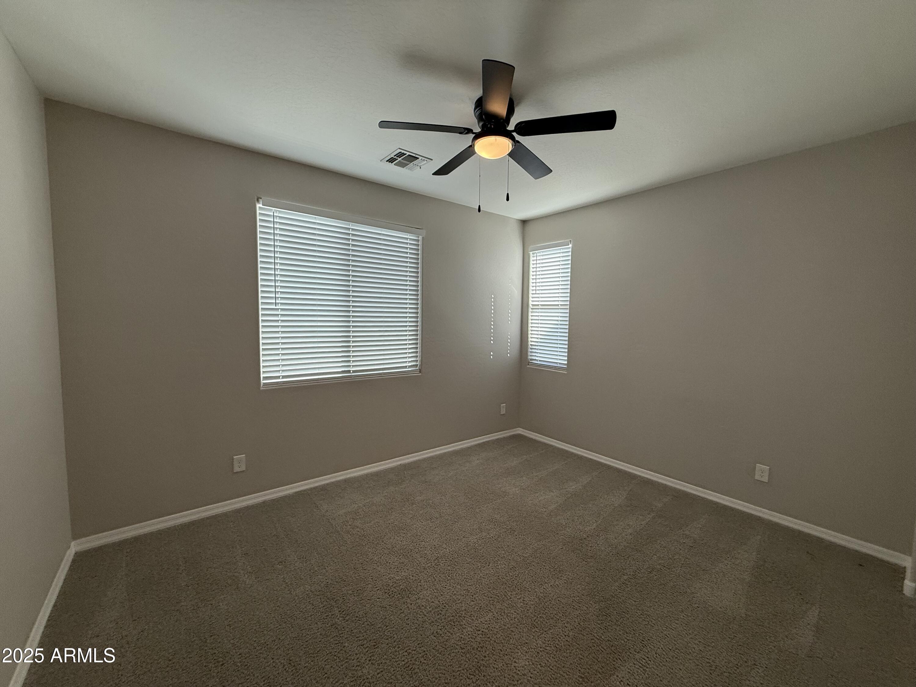 3786 East Robert Street Gilbert, AZ 85295 - Photo 16 of 22 a view of an empty room with a window