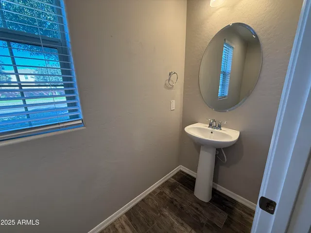 a bathroom with a sink toilet
