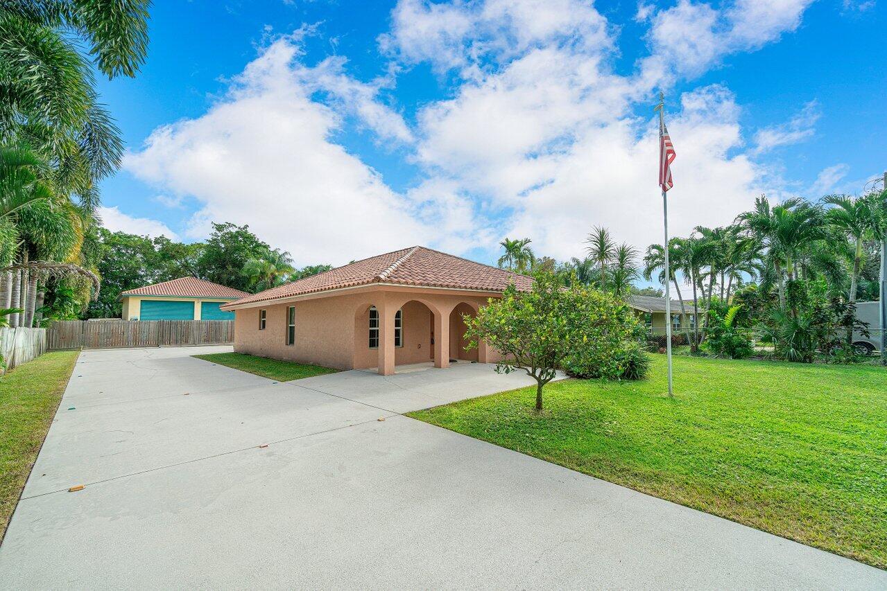 5592 1st Road Lake Worth, FL 33467 - Photo 2 of 22 002-55921stRoad-LakeWorth-FL-33467-SMALL