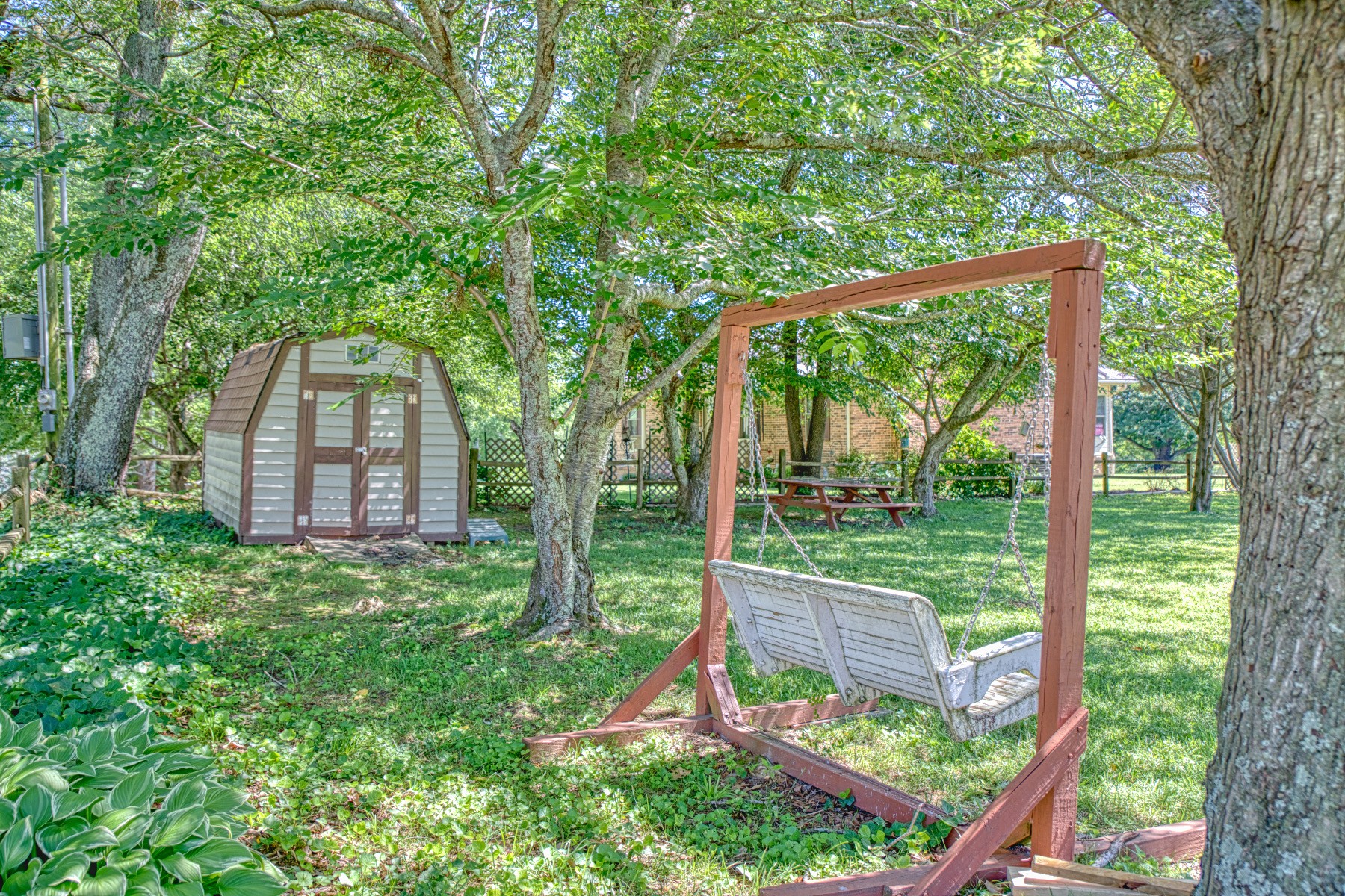 2085 Herbert Garrett Road Cookeville, TN 38506 - Photo 33 of 39 a view of a house with a backyard and a tree