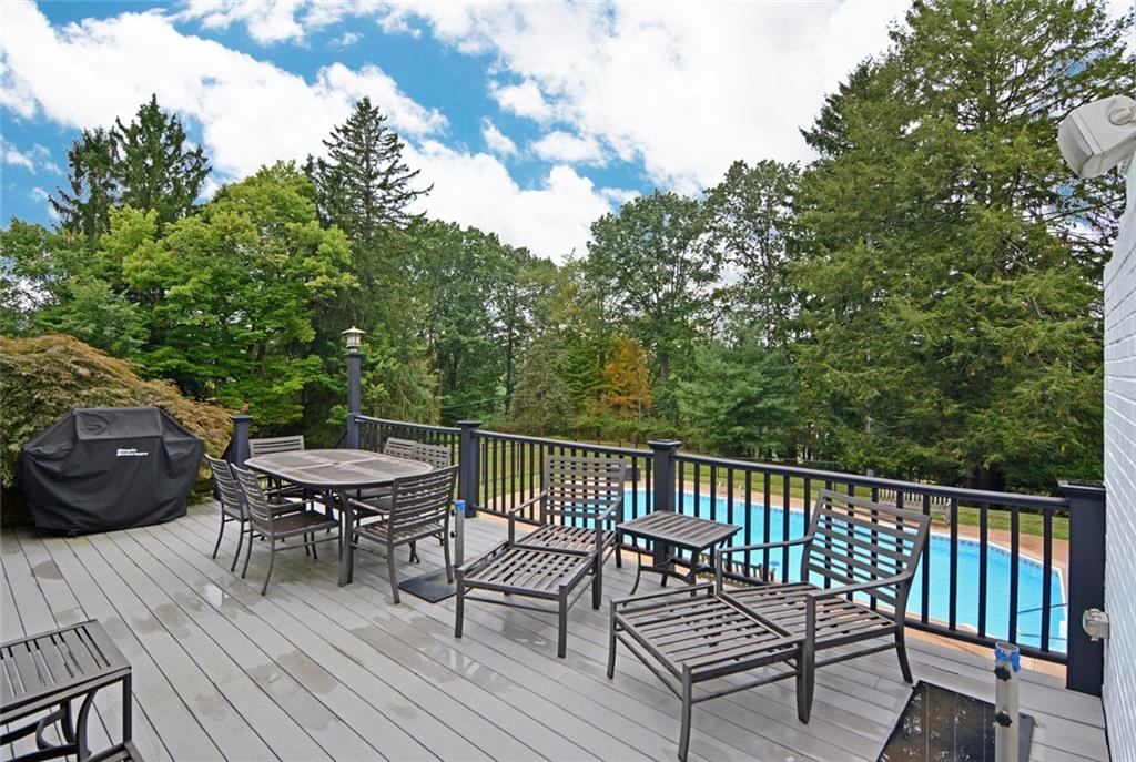 407 Rhodora Lane Pittsburgh, PA 15238 - Photo 15 of 48 a view of a wooden deck with furniture