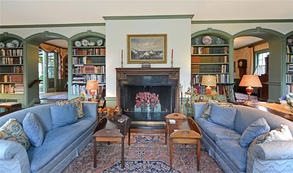 407 Rhodora Lane Pittsburgh, PA 15238 - Photo 23 of 48 a living room with furniture a fireplace and a large window