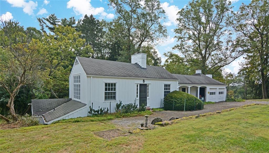 407 Rhodora Lane Pittsburgh, PA 15238 - Photo 26 of 48 a backyard of a house with table and chairs
