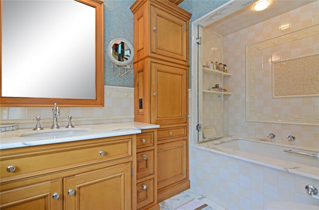 407 Rhodora Lane Pittsburgh, PA 15238 - Photo 44 of 48 a bathroom with a bathtub and a sink