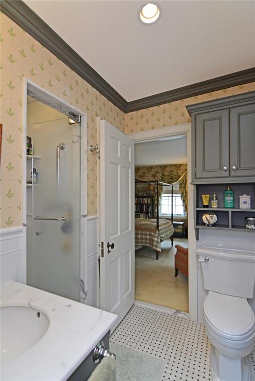407 Rhodora Lane Pittsburgh, PA 15238 - Photo 46 of 48 a bathroom with a sink a toilet and shower