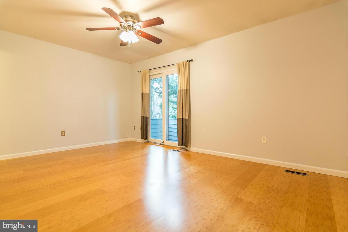1017 Cedar Ridge Court Annapolis, MD 21403 - Photo 15 of 20 a view of an empty room and chandelier fan