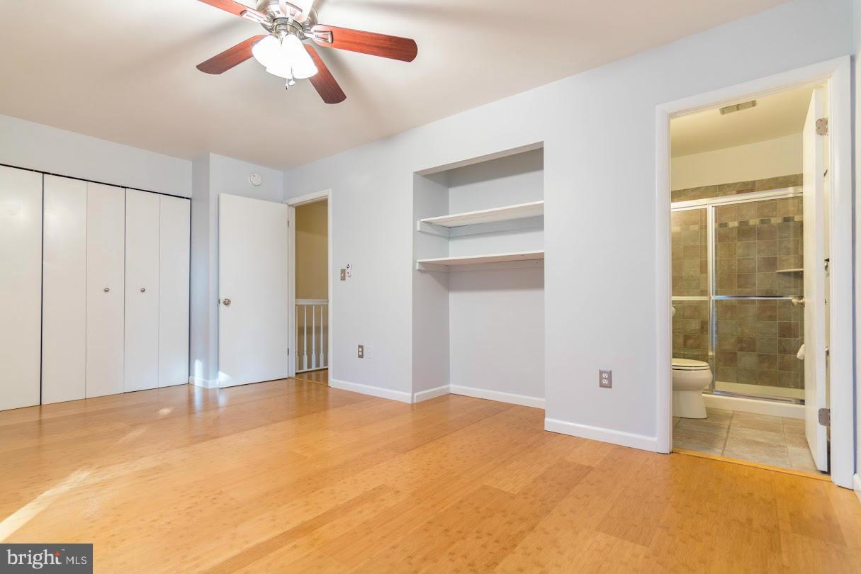 1017 Cedar Ridge Court Annapolis, MD 21403 - Photo 17 of 20 a view of an empty room with a chandelier fan